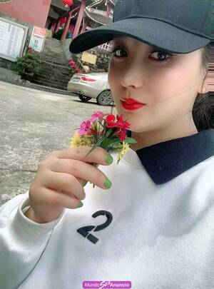 JOVEN ORIENTAL CON ENCANTO NATURAL