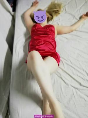 Hermosa y sensual niña ojiverde y rubia natutal
